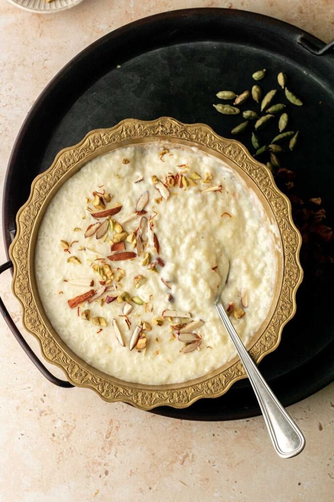 Creamy homemade kheer garnished with nuts Contact Our Home Kitchen to order